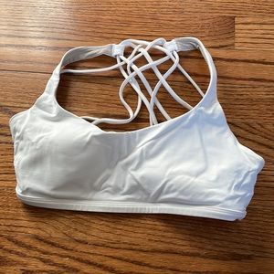 FREE TO BE WILD WHITE BRA. Great condition, minor fraying on back strap